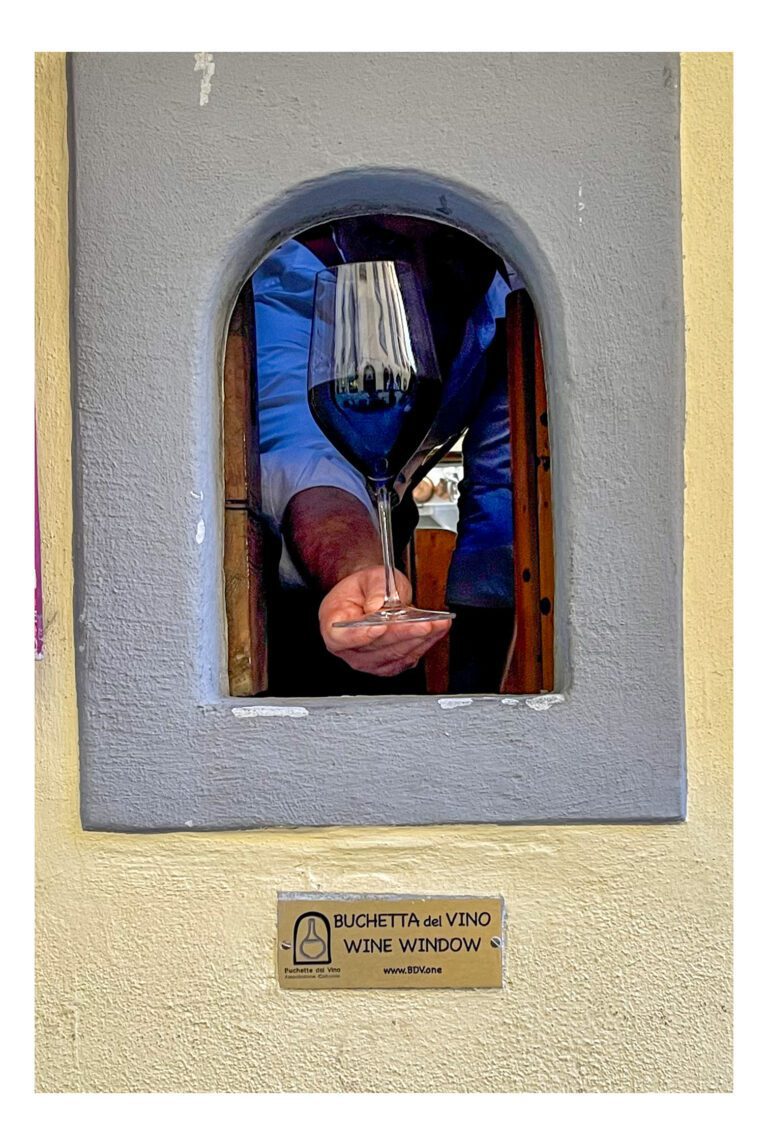 Getting a glass of wine from a Buchette Del Vino
